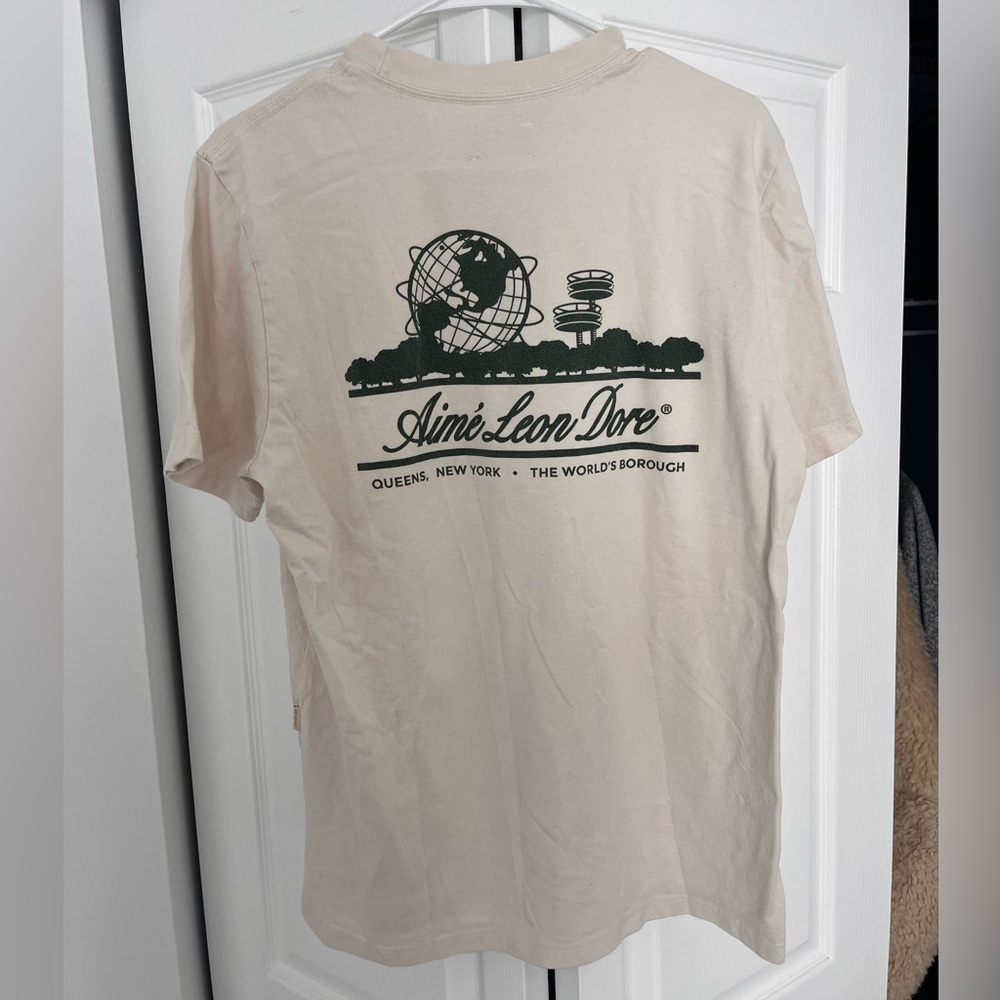 Aime Leon Dore Men's Unisphere Cream T-shirt